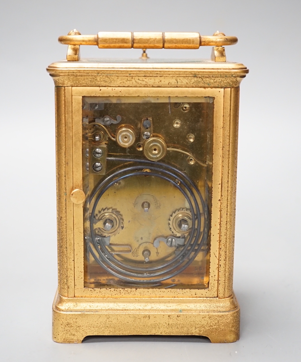 A French brass carriage clock with alarm and push repeat, retailers mark Luis E. Sinn Co. - 15cm